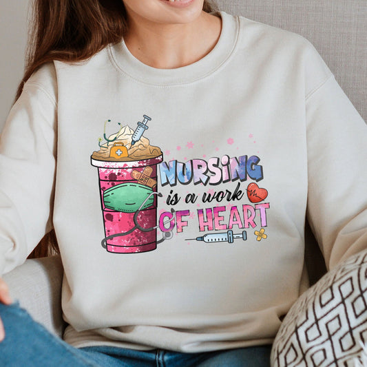 Nursing Is A Work Of Heart Crewneck Sweatshirt, Coffee Nurse Pink Heart Christmas Gift
